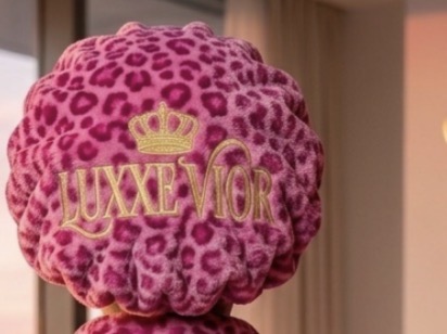 Back of Pink Leopard sleep headwear showing the embroidered Luxxe Vior logo